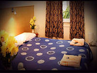 A Typical Double Bedroom at Arriva Hotel