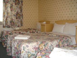 A Typical Quad Room at Belgrove Hotel