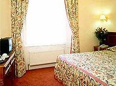 A room at Pembridge Palace Hotel