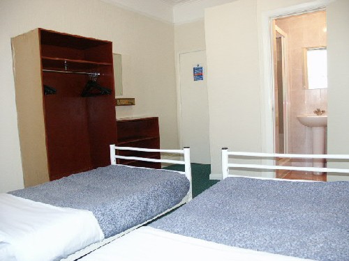 A twin room at London House Hotel